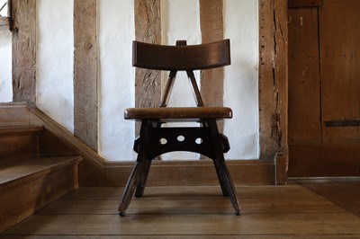 Lot 23 - A 'Granville' oak chair designed by E W Pugin