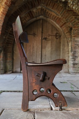 Lot 23 - A 'Granville' oak chair designed by E W Pugin