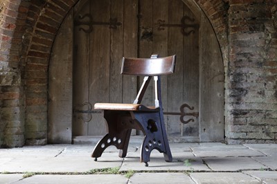 Lot 23 - A 'Granville' oak chair designed by E W Pugin