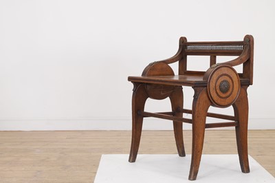 Lot 571 - A Victorian oak and brass-mounted stool by James Shoolbred & Co.