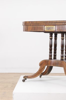 Lot 280 - A Regency rosewood and brass card table
