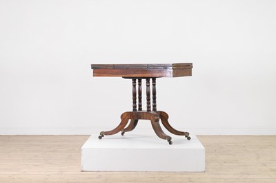 Lot 280 - A Regency rosewood and brass card table