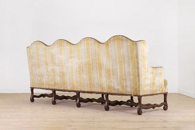 Lot 87 - A pair of Louis XV walnut sofas