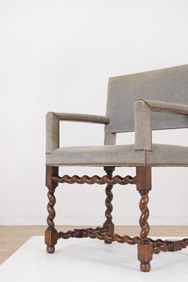 Lot 68 - A walnut elbow chair