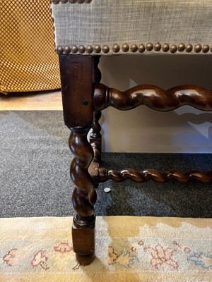 Lot 68 - A walnut elbow chair
