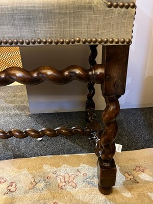 Lot 68 - A walnut elbow chair