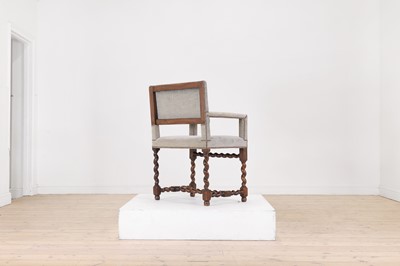 Lot 68 - A walnut elbow chair