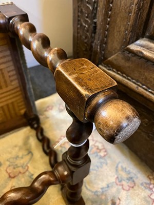 Lot 68 - A walnut elbow chair