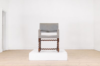 Lot 68 - A walnut elbow chair