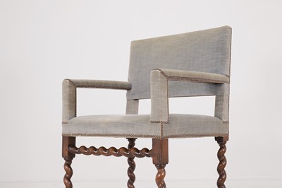 Lot 68 - A walnut elbow chair