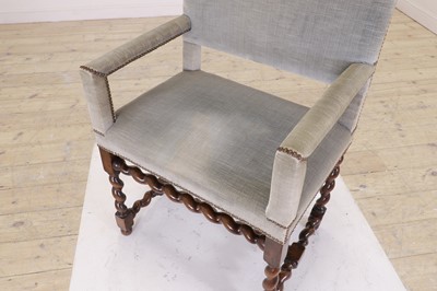 Lot 68 - A walnut elbow chair