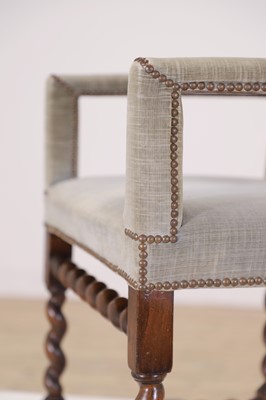 Lot 68 - A walnut elbow chair