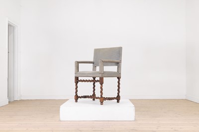Lot 68 - A walnut elbow chair