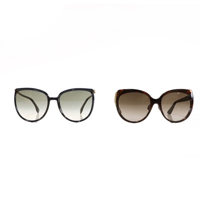Lot 1541 - A pair of Christian Dior faux tortoiseshell and silver-rimmed sunglasses
