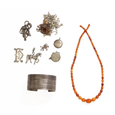 Lot 1326 - A copal resin necklace and a small collection of silver