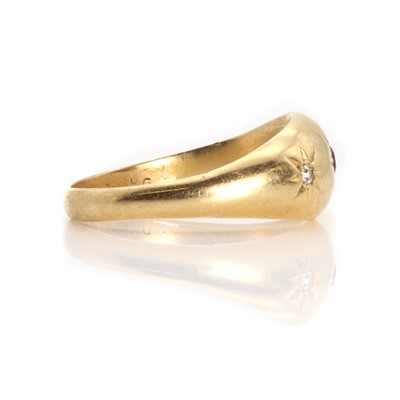 Lot 1029 - An 18ct gold three stone ruby and diamond star set gypsy ring