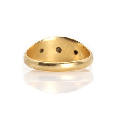 Lot 1029 - An 18ct gold three stone ruby and diamond star set gypsy ring