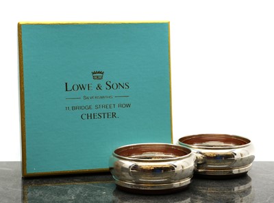 Lot 46 - A pair of silver coasters