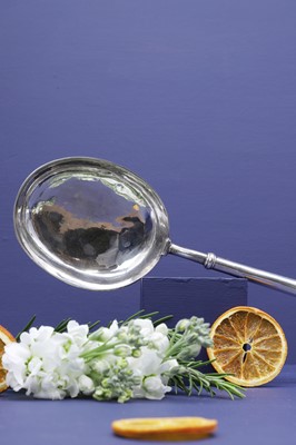 Lot 331 - A large Queen Anne silver anointing spoon