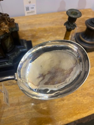 Lot 331 - A large Queen Anne silver anointing spoon