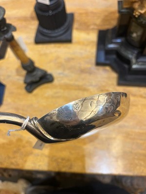 Lot 331 - A large Queen Anne silver anointing spoon