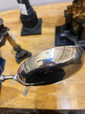 Lot 331 - A large Queen Anne silver anointing spoon