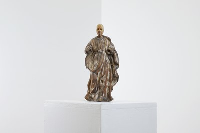 Lot 591 - An ivory-mounted and carved wood figure