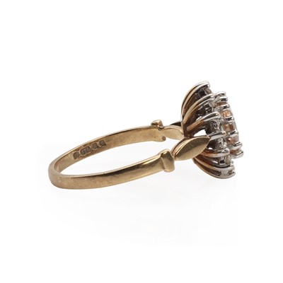 Lot 1108 - A 9ct gold morganite and diamond cluster ring