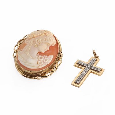 Lot 1256 - A gold diamond cross pendant and a gold shell cameo pendant/brooch