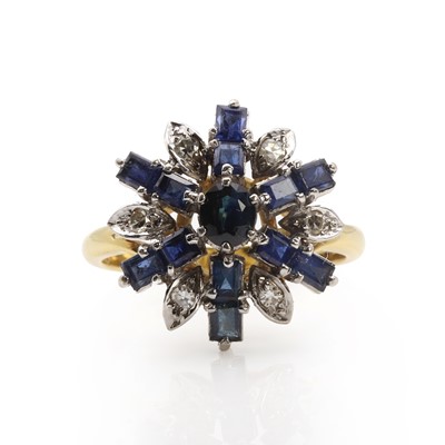 Lot 1161 - A gold sapphire and diamond target cluster ring