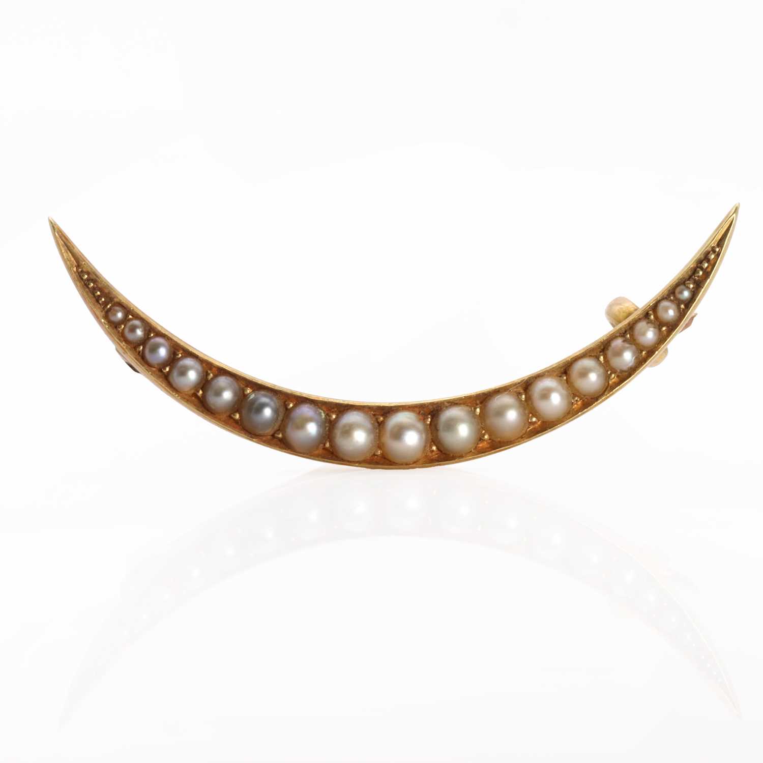 Lot 1015 - A Victorian gold seed pearl crescent brooch