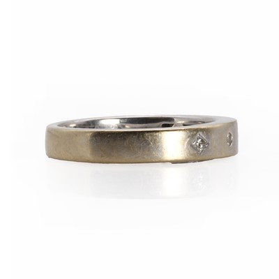Lot 1106 - An 18ct white gold five stone diamond band ring