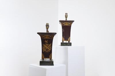 Lot 159 - A pair of painted and parcel-gilt toleware lamps