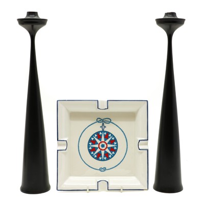 Lot 153 - A pair of slender ebonised candlesticks