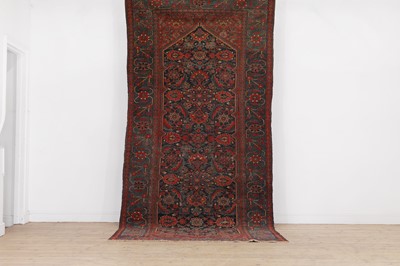 Lot 209 - A Persian Hamadan wool runner