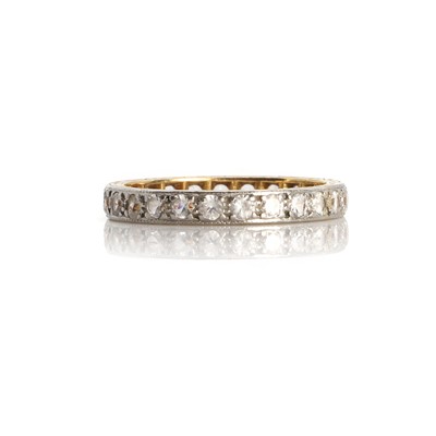 Lot 1089 - An 18ct gold full hoop eternity ring