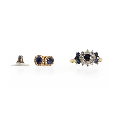 Lot 1162 - A sapphire and diamond ring
