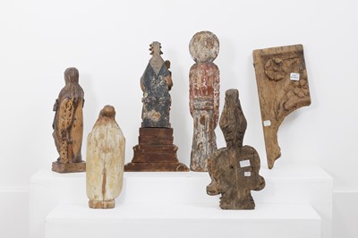 Lot 93 - A group of carved wood saints and architectural fragments