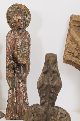Lot 93 - A group of carved wood saints and architectural fragments