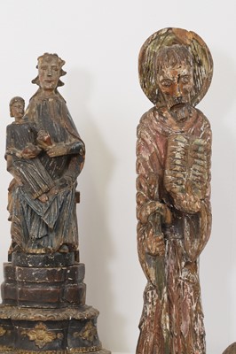 Lot 93 - A group of carved wood saints and architectural fragments