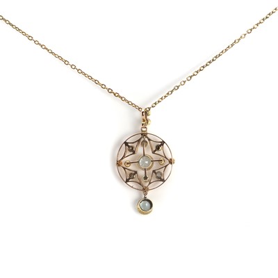 Lot 1035 - A gold split pearl, topaz and aquamarine drop pendant