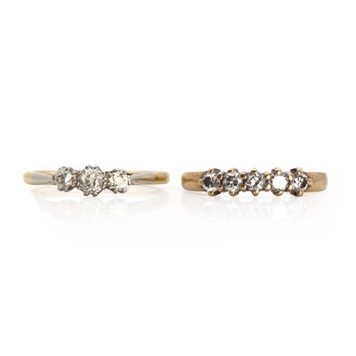Lot 1072 - A three stone diamond ring
