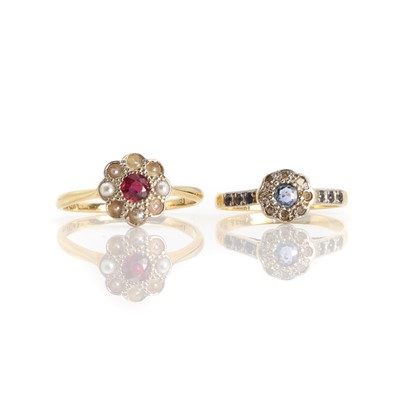 Lot 1254 - A ruby and seed pearl flowerhead cluster ring