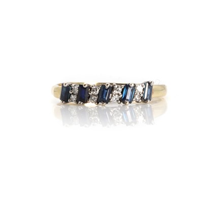 Lot 1160 - A 9ct gold sapphire and diamond ring