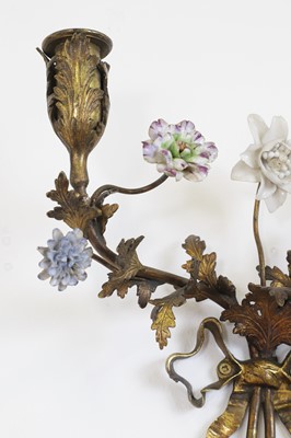 Lot 209 - A pair of Louis XV-style ormolu and porcelain wall lights