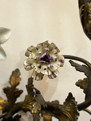 Lot 209 - A pair of Louis XV-style ormolu and porcelain wall lights