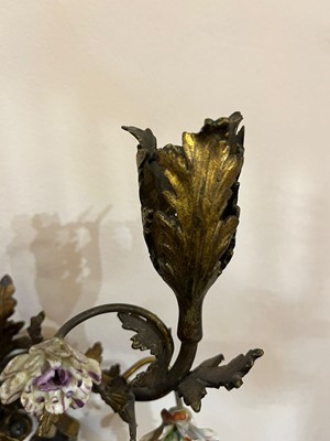 Lot 209 - A pair of Louis XV-style ormolu and porcelain wall lights