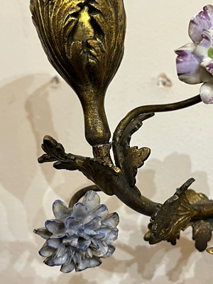 Lot 209 - A pair of Louis XV-style ormolu and porcelain wall lights