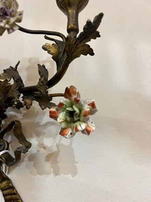 Lot 209 - A pair of Louis XV-style ormolu and porcelain wall lights