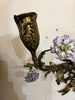 Lot 209 - A pair of Louis XV-style ormolu and porcelain wall lights